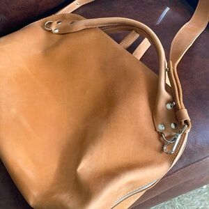 Brand New! Genuine leather unisex crossbody/travel bag.